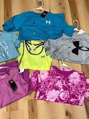 Lot of youth XL tee shirts and tanks. All new with tags